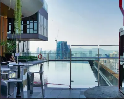 a swimming pool on the roof of a building at Ceylonz Suites Bukit Bintang By ICEFLY in Kuala Lumpur