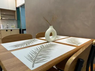 a table with a white vase on top of it at KL City 3BR 3Bath Condo , Razak city ,TV box & Pool in Kuala Lumpur