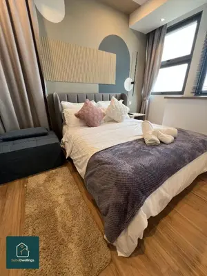 a bedroom with a large bed and a window at TheRiv Boutique Suites at Riveria City KL Sentral by Suite Dwellings in Kuala Lumpur