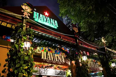 a hawanna sign on the side of a building at Bukit Ceylon Suites At RMAD KLCC in Kuala Lumpur