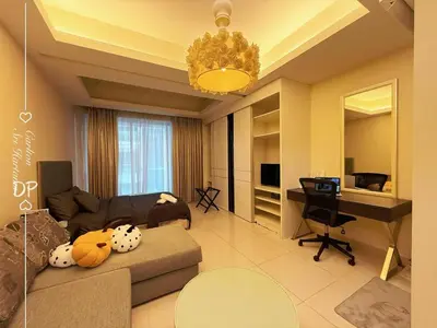 a living room with a couch and a piano at Damas Suite Sri Hartamas 4 pax Link to Mall in Kuala Lumpur