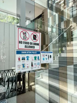 a no food or drink allowed sign on the side of a building at Damas Suite Sri Hartamas 4 pax Link to Mall in Kuala Lumpur