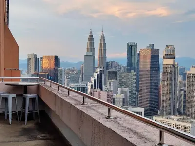 a view of a city skyline with tall buildings at Urban Suite At Times Square KL in Kuala Lumpur