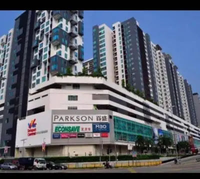 a large building with tall buildings in a city at Zetapark condominium in Kuala Lumpur