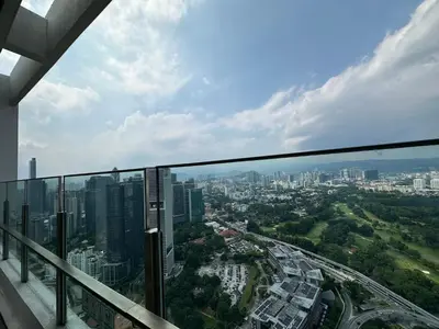 a view of a city from the top of a building at Agile Suites TRX KlCC in Kuala Lumpur