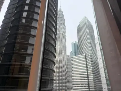 a view of a city skyline from a building at Dawn Legacy Suite in Kuala Lumpur