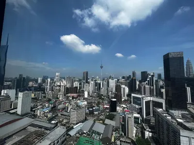 a view of a large city with tall buildings at Axon Residence Bukit Bintang by Comfort Stay in Kuala Lumpur