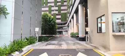 an empty hallway of a building with plants at Agile Service Residence by TRX KLCC in Kuala Lumpur
