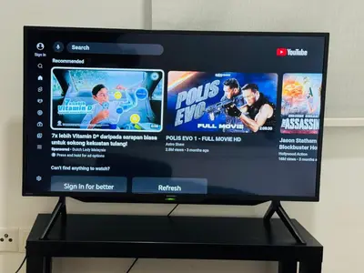 a television screen with a video game on it at The Luxe & Colony KLCC By LuxeHub in Kuala Lumpur