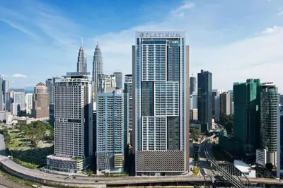 a view of a large city with tall buildings at The Calma, Platinum Suites 2 BR in Kuala Lumpur