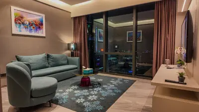a living room with a couch and a table at Imperial Residences KLCC - MK HOME in Kuala Lumpur