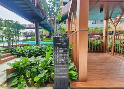 a sign in the middle of a garden at trion Klcc 2 bedroom apartment in Kuala Lumpur