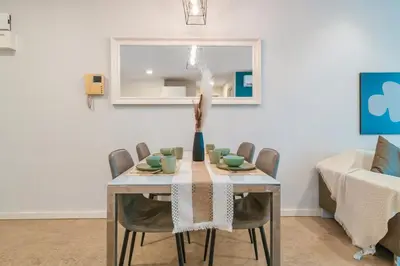 a dining room with a table and chairs at Bintang Fairlane near Pavillion Bukit Bintang in Kuala Lumpur