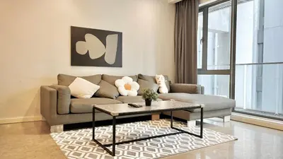 a living room with a couch and a coffee table at Bintang Fairlane near Pavillion Bukit Bintang in Kuala Lumpur