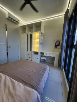 a bedroom with a bed and a ceiling fan at klcc 2 bedroom trion in Kuala Lumpur