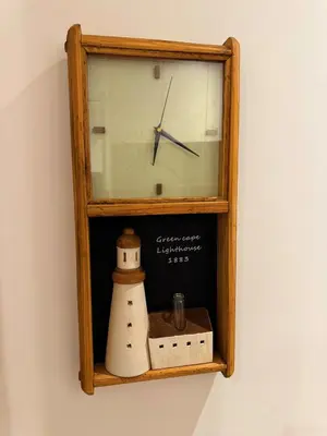 a clock on a wall with a lighthouse on it at M Centura Sentul, Jalan Sentul Pasar, Sentul KL City in Kuala Lumpur