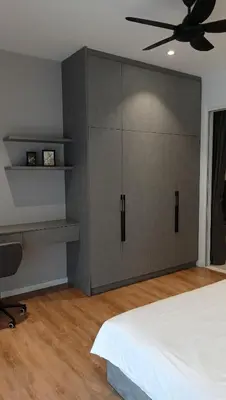 a bedroom with a bed and a ceiling fan at Quill Residence - Blissful Urban Condo by Azmila in Kuala Lumpur