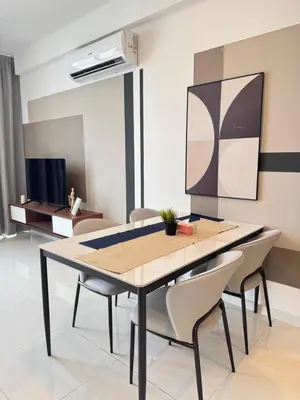 a dining room with a table and chairs at Majestic Residence Suite KLCC in Kuala Lumpur