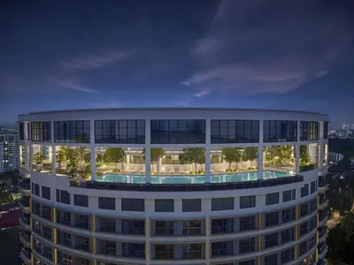 a building with a pool in the middle of it at The Atrium at Jalan Ampang by OKBnB- Modern Cozy 3 Bedroom Apartment 4 Mins to KLCC in Kuala Lumpur