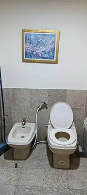 a bathroom with a toilet and a sink at Times Square apartment klcc in Kuala Lumpur