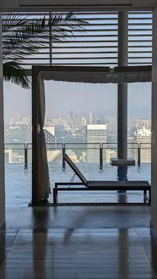 an empty building with a view of the water at Pavilion Ceylon Hill Luxury apartment Bukit Bintang by cupidhome in Kuala Lumpur