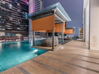 a swimming pool on the roof of a building at Family Suites Reizz Ampang 2R2B in Kuala Lumpur