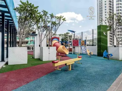 a playground with a slide at Family Suites Reizz Ampang 2R2B in Kuala Lumpur