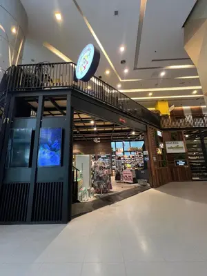 a shopping mall with a clock on top of it at Mercu summer suits 1BR luxury couple room free Netflix 5mint WD KLCC by Top R in Kuala Lumpur