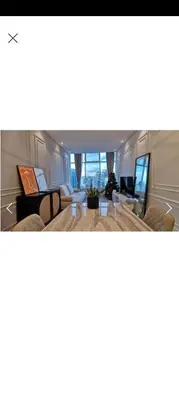 a living room with a couch and a table at Sky Suite By SmartWill Properties in Kuala Lumpur