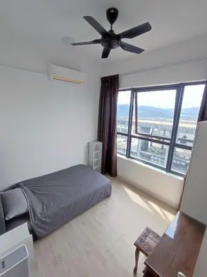 a bedroom with a bed and a ceiling fan at Comfy Room in High Floor! in Kuala Lumpur