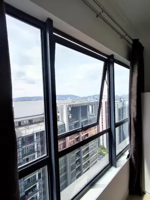 a window with a view of the city at Comfy Room in High Floor! in Kuala Lumpur