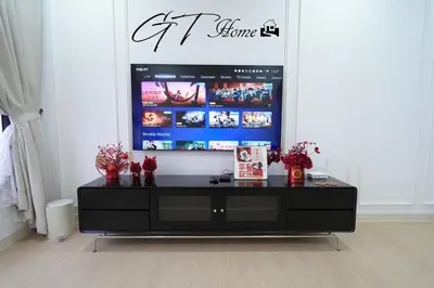 a black entertainment center in a living room at Gt home-Kuala Lumpur View 3Bedroom 2Bathroom in Kuala Lumpur