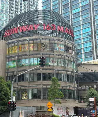 a building with a sign that reads sun way mad at Arcoris SOHO Mont Kiara 2B2B, Home Stay in Kuala Lumpur
