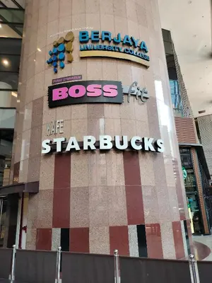 a building with a sign on the side of it at Homestay suite at times square KL in Kuala Lumpur