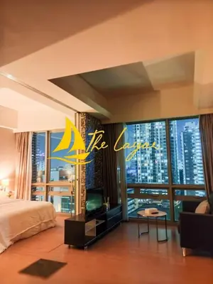 a bedroom with a bed and a view of a city at Central 1BR Merdeka 118 View in Kuala Lumpur