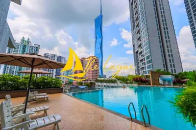 a swimming pool in the middle of a city with buildings at Central 1BR Merdeka 118 View in Kuala Lumpur