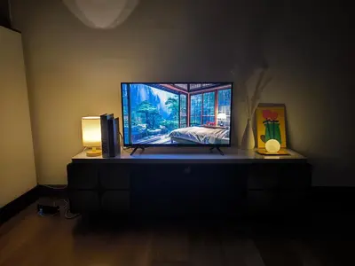 a television sitting on top of a table at Regalia Residence KLCC By Rainbow in Kuala Lumpur