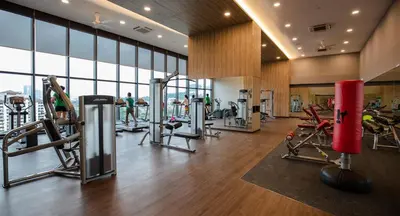 a gym with treadmills and cardio equipment in a building at 28 Boulevard - Pandan Perdana Cheras KL in Kuala Lumpur