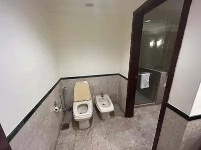 a bathroom with a toilet and a shower at My Residence suite at Berjaya times square Kl in Kuala Lumpur