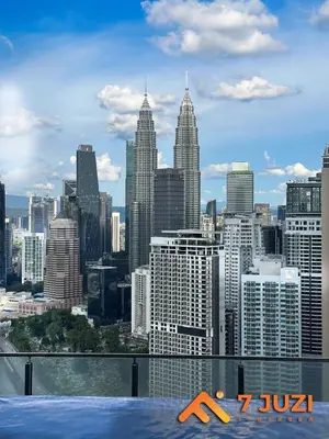 a view of a city skyline with tall buildings at KLCC Cozy Suite 21F with Best View Infinity Pool in Kuala Lumpur