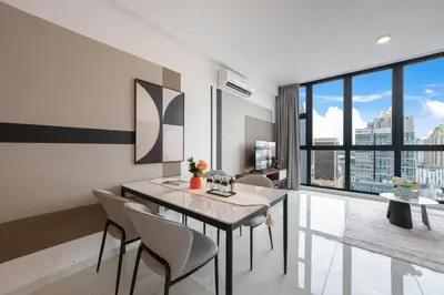 a dining room with a table and chairs and a large window at Majestic by Avery at KLCC#Located in the City Center#10 mins Walk to Twin Towers#Rooftop Infinity pool#\u4e2d\u82f1\u6587\u623f\u4e1c in Kuala Lumpur