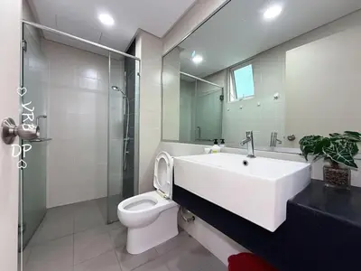 a bathroom with a sink and a toilet and a mirror at VR3 2R2B 6pax Sunway Velocity LINK Mall MRT in Kuala Lumpur