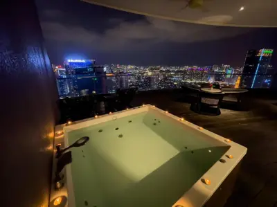 a room with a pool table on top of a building at The Luxury Penthouse KLCC in Kuala Lumpur