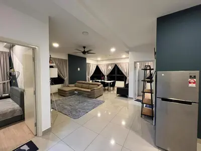 a large living room with a couch and a table at Sweethome in Kuala Lumpur