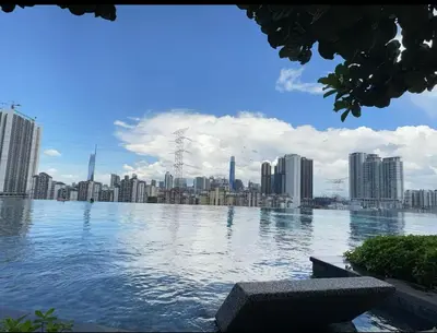 a large body of water with a city in the background at Kuala Lumpur, Sunway Velocity, M Vertica, 8-10Pax in Kuala Lumpur