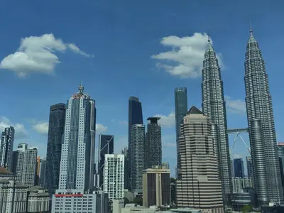 a view of a large city with tall buildings at Legasi Kampong Bharu in Kuala Lumpur