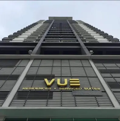 a tall building with the vue sign on it at VUE RESIDENCE -3 ROOMs in Kuala Lumpur