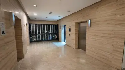 a hallway of a building with wooden walls at The Elements Ampang A place of Tranquility Premium in Kuala Lumpur