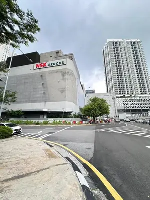 an empty street in front of a building at The Colony By Infinitum With Klcc View in Kuala Lumpur