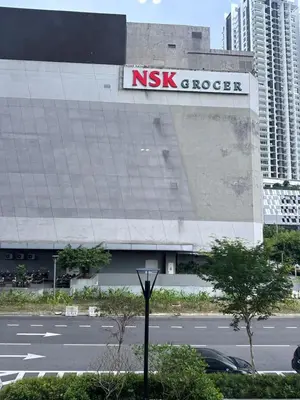 a nx energy sign on the side of a building at The Colony By Infinitum With Klcc View in Kuala Lumpur